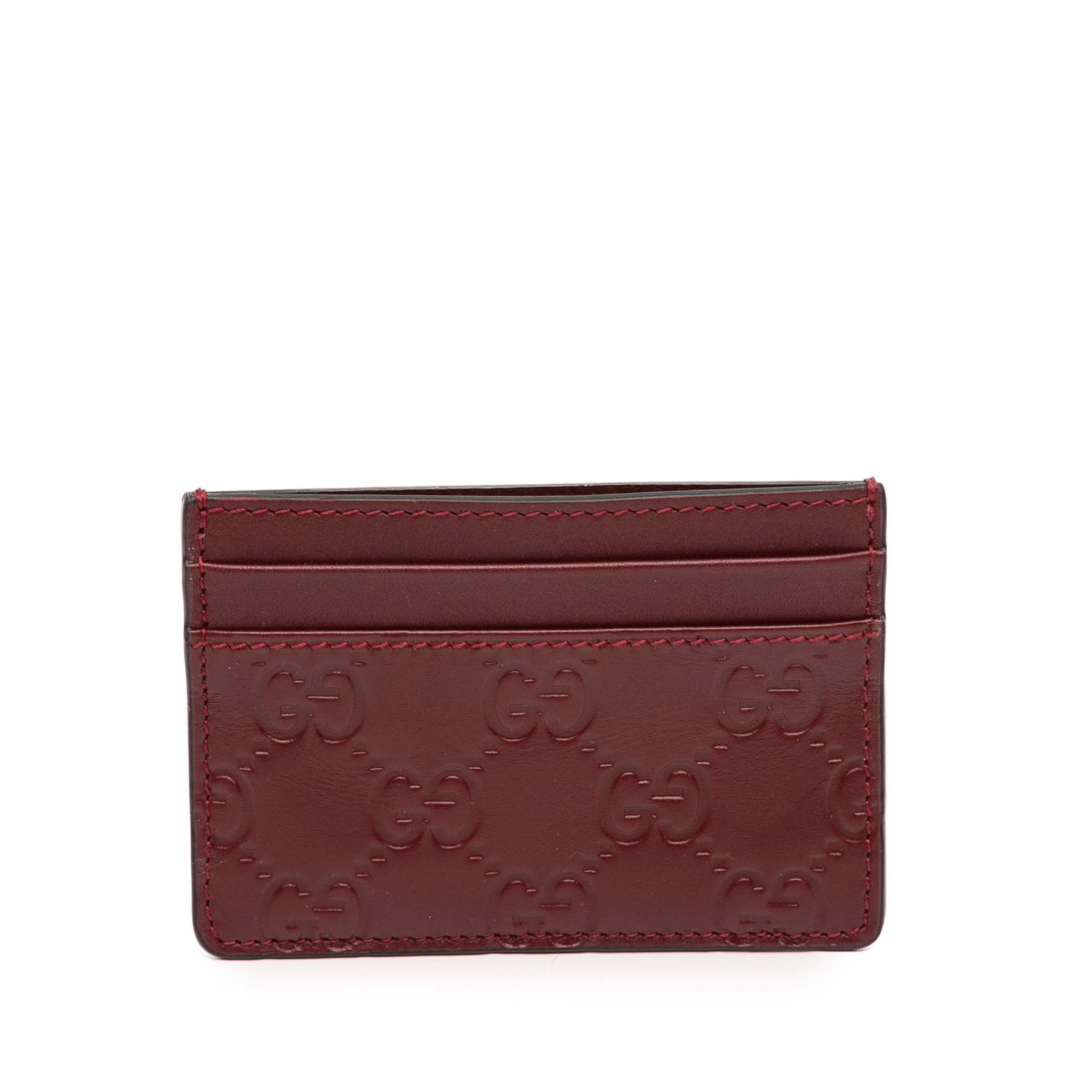 Gucci Guccissima Red Embossed Leather Card Holder with Slip Pockets: Gucci Guccissima Red Embossed Leather Card Holder with Slip Pockets This card holder features an embossed leather body with exterior slip pockets, designed in a striking red color. It offers a compact