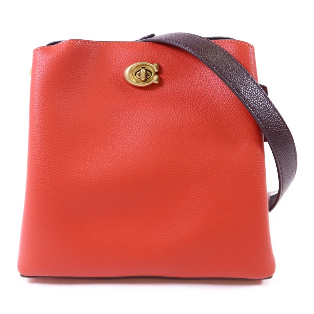 Red Calfskin Willow Bucket Shoulder Bag by COACH with Gold Hardware: Red Calfskin Willow Bucket Shoulder Bag by COACH with Gold Hardware This Coach Willow Bucket shoulder bag features a red calfskin leather exterior and a regular size type. The bag is designed with a p