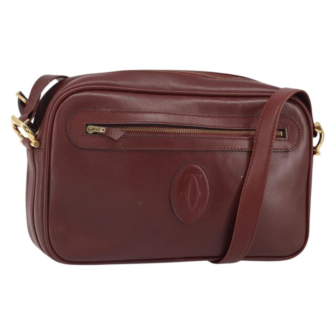 Cartier Must Line Bordeaux Leather Shoulder Bag Gold Accents with Cards: Cartier Must Line Bordeaux Leather Shoulder Bag Gold Accents with Cards This Cartier Must Line shoulder bag features a Bordeaux leather exterior with gold-tone accents. Designed for women, it offers a