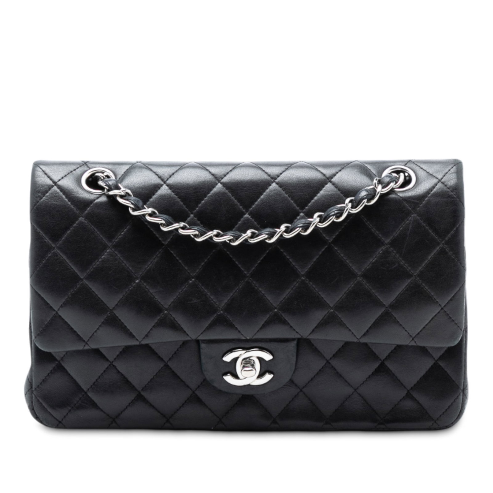 Black Leather Shoulder Bag Chanel Medium Classic Double Flap Quilted: Black Leather Shoulder Bag Chanel Medium Classic Double Flap Quilted This Chanel Medium Classic Double Flap shoulder bag features a black quilted lambskin leather body and leather-woven chain straps. 