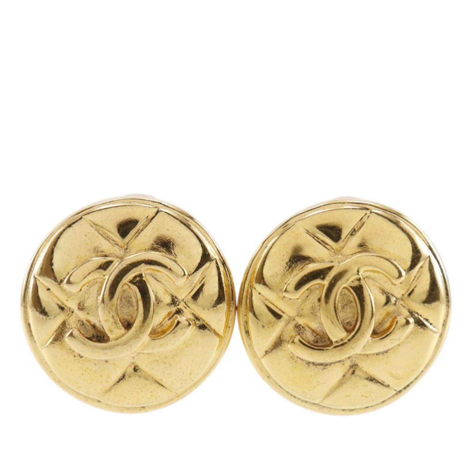 Chanel CC Logo Gold Plated Quilted Round Clip Earrings: Chanel CC Logo Gold Plated Quilted Round Clip Earrings These Chanel CC Quilted round clip-on earrings feature a gold-plated metal body with a classic quilted design and clip-on closures. They come wit