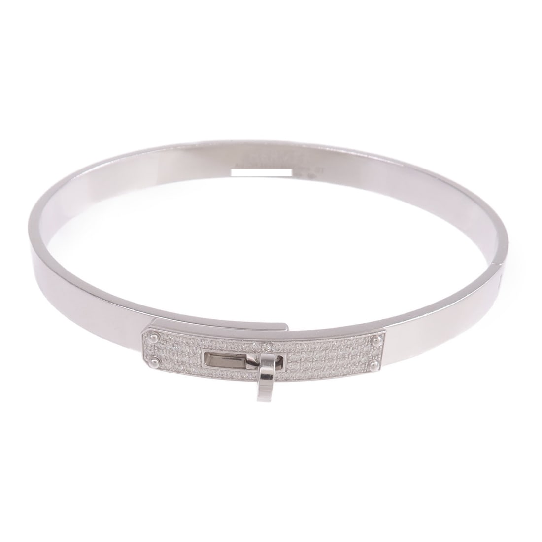 Kelly Small Diamond Bracelet in 18K White Gold by Hermes: Kelly Small Diamond Bracelet in 18K White Gold by Hermes This Hermes Kelly bracelet features a small model design crafted from 18K white gold and adorned with diamonds. Made in France, it is designed 