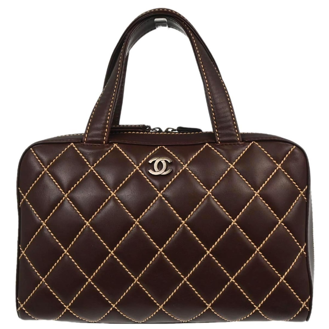 Wild Stitch Medium Top Handle Bag in Brown Calfskin by Chanel: Wild Stitch Medium Top Handle Bag in Brown Calfskin by Chanel This Chanel Wild Stitch handbag is crafted from brown calfskin leather with a quilted pattern and features a zip closure. Designed with a 