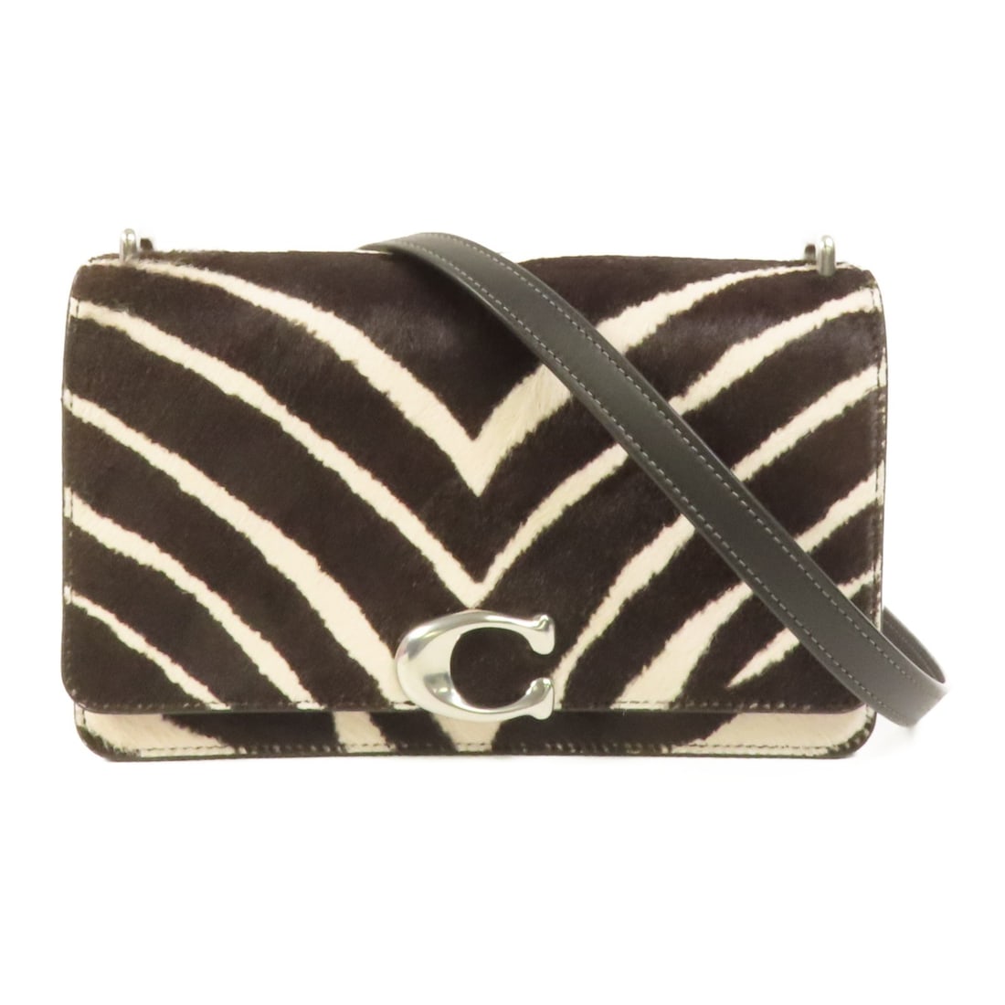 Coach Shoulder Bag Black and White Calfskin Leather Model 52357 SHW: Coach Shoulder Bag Black and White Calfskin Leather Model 52357 SHW This COACH shoulder bag features a black and white calfskin leather exterior, offering a modern and versatile design. Crafted for wo