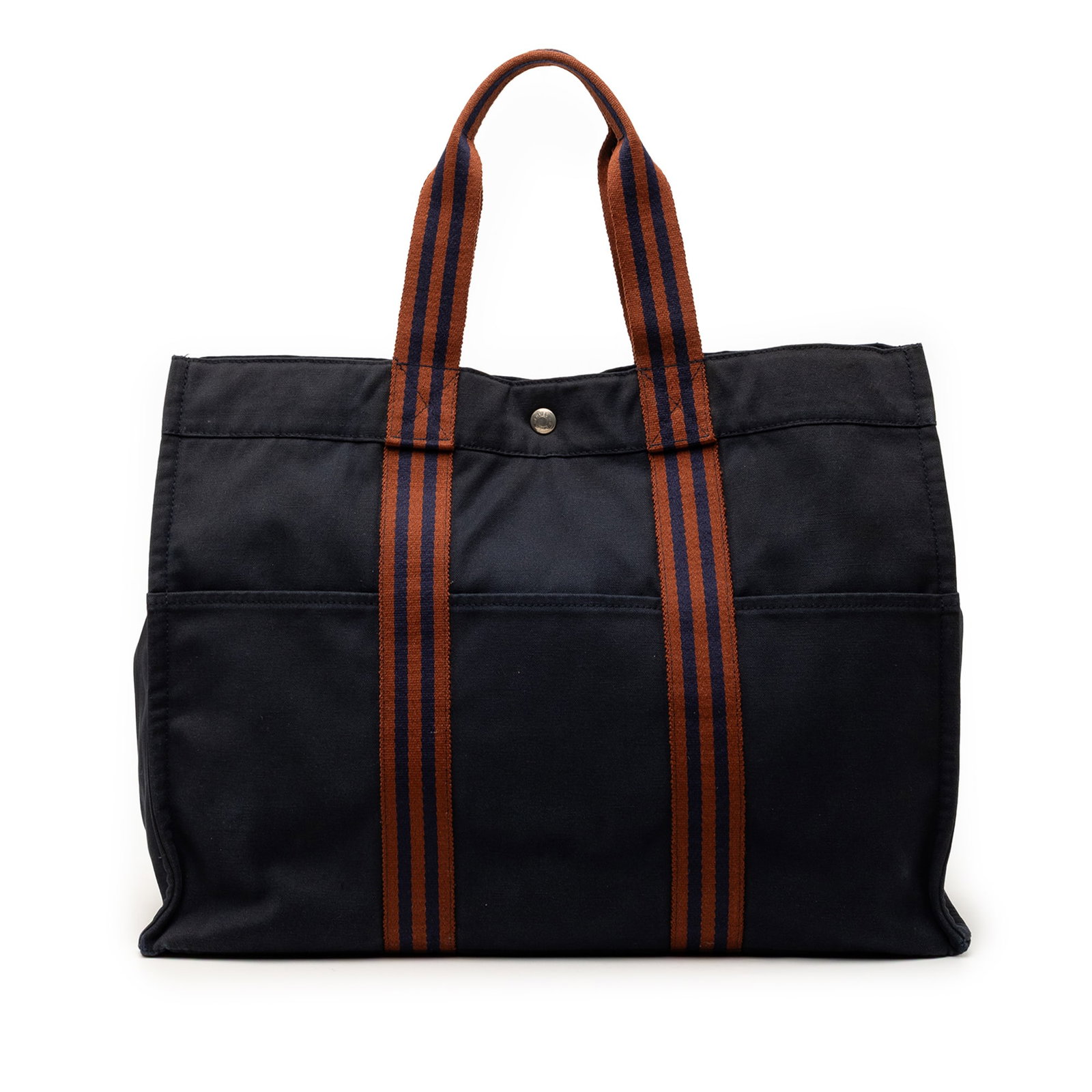 Blue Fabric Tote Fourre Tout GM by Hermes with Snap Closure: Blue Fabric Tote Fourre Tout GM by Hermes with Snap Closure The Hermes Fourre Tout GM is a blue canvas tote featuring flat straps, an open top with a snap closure, and an interior zip compartment. Thi