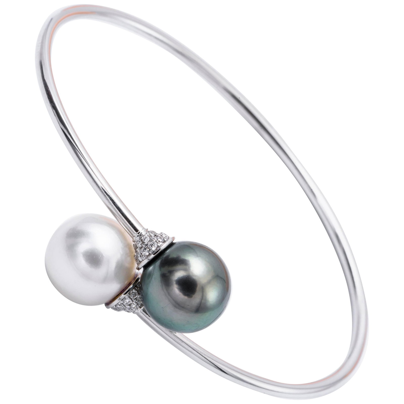 Harbor Diamonds 18K White Gold Pearl Diamond Bypass Bangle: Harbor Diamonds 18K White Gold Pearl Diamond Bypass Bangle This exquisite bypass bangle showcases a stunning combination of South Sea and Tahitian pearls, elegantly complemented by 42 round-cut