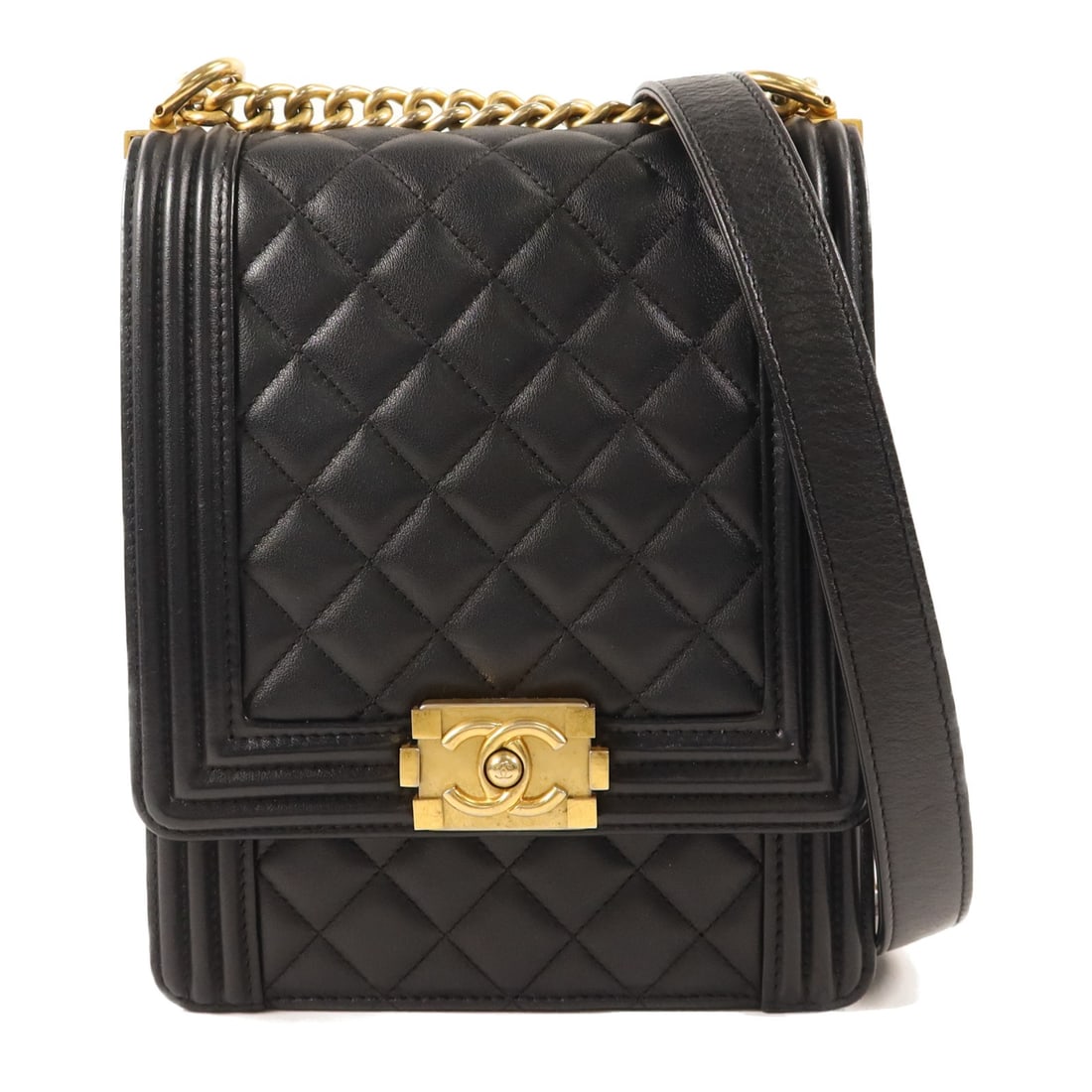 Black Calfskin Le Boy Shoulder Bag with Gold CC Hardware by Chanel: Black Calfskin Le Boy Shoulder Bag with Gold CC Hardware by Chanel This CHANEL Le Boy chain shoulder bag features a distinctive CC clasp and is crafted from black calfskin leather. Designed for women,