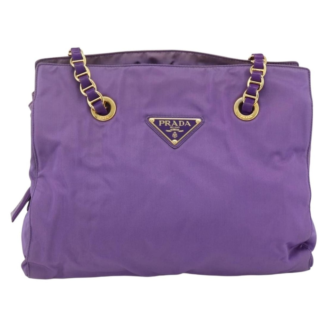 Prada Tessuto Purple Nylon Vintage Shoulder Purse 32cm x 27cm x 9cm: Prada Tessuto Purple Nylon Vintage Shoulder Purse 32cm x 27cm x 9cm This Prada vintage shoulder bag is crafted from purple nylon and designed for women. It features signs of wear including rubbing and