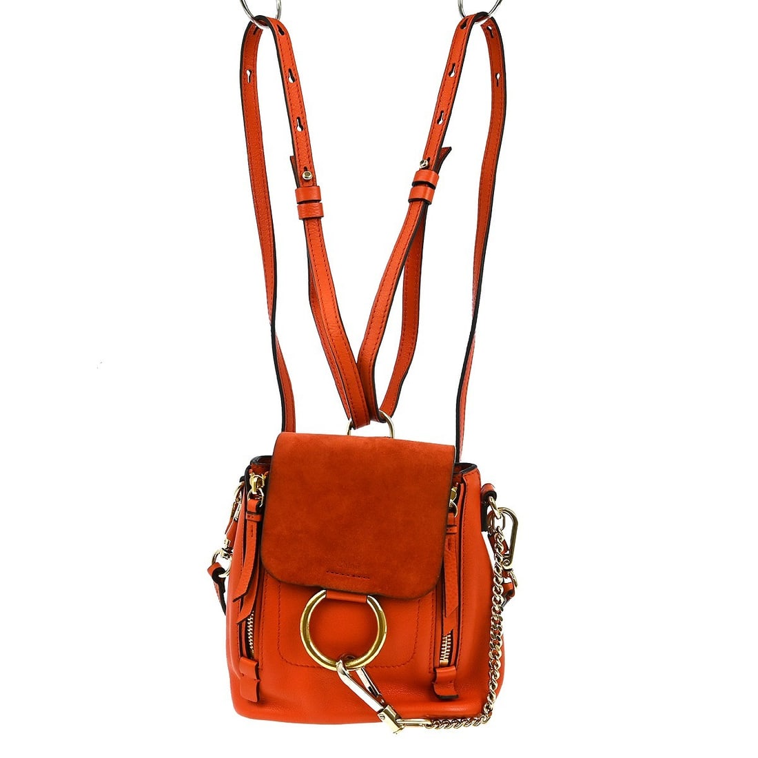 Chloe Mini Faye Daye Orange Suede Leather Backpack with Shoulder Strap: Chloe Mini Faye Daye Orange Suede Leather Backpack with Shoulder Strap Introducing the Chloe Mini Faye Daye Backpack, a stylish accessory perfect for casual occasions. This mini backpack features a st