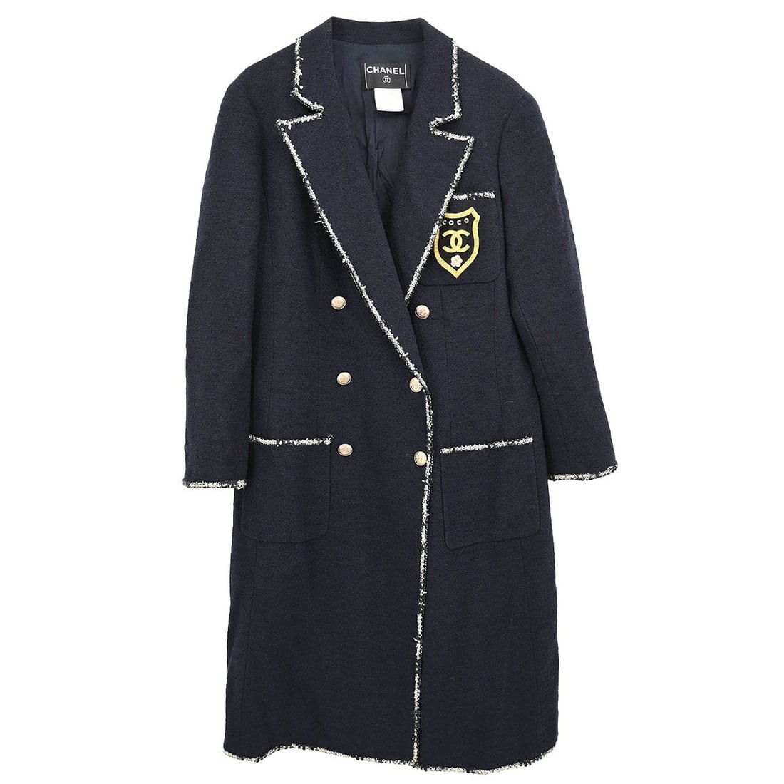 Chanel Navy Double Breasted Long Wool Jacket with Logo Accent Size FR 46: Chanel Navy Double Breasted Long Wool Jacket with Logo Accent Size FR 46 This Chanel double-breasted jacket features a navy color and is crafted from a blend of wool, cotton, and nylon. Designed in a 