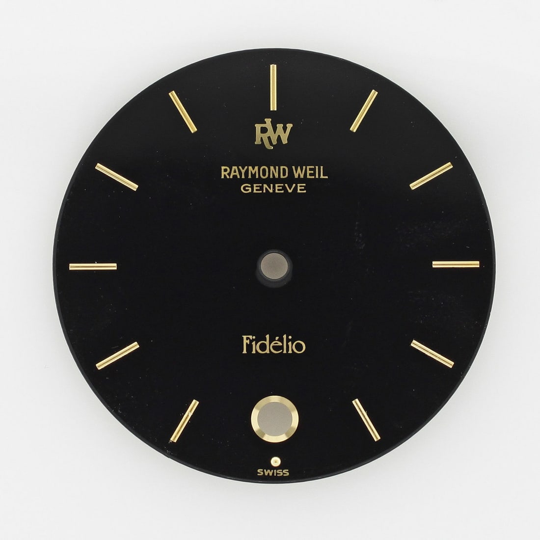 Raymond Weil Fidelio Black Dial Replacement 27mm Unisex: Raymond Weil Fidelio Black Dial Replacement 27mm Unisex This Raymond Weil Geneve Fidelio watch dial features a sleek black color, perfect for adding sophistication to your timepiece. Designed for the 