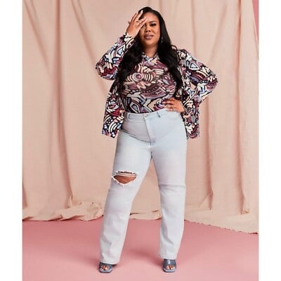 Nina Parker Plus Size Light Wash Wide Leg Jeans 20W: Nina Parker Plus Size Light Wash Wide Leg Jeans 20W These Nina Parker plus size high-waist jeans feature a trendy wide-leg silhouette and stylish ripped details. Designed for comfort and support, they
