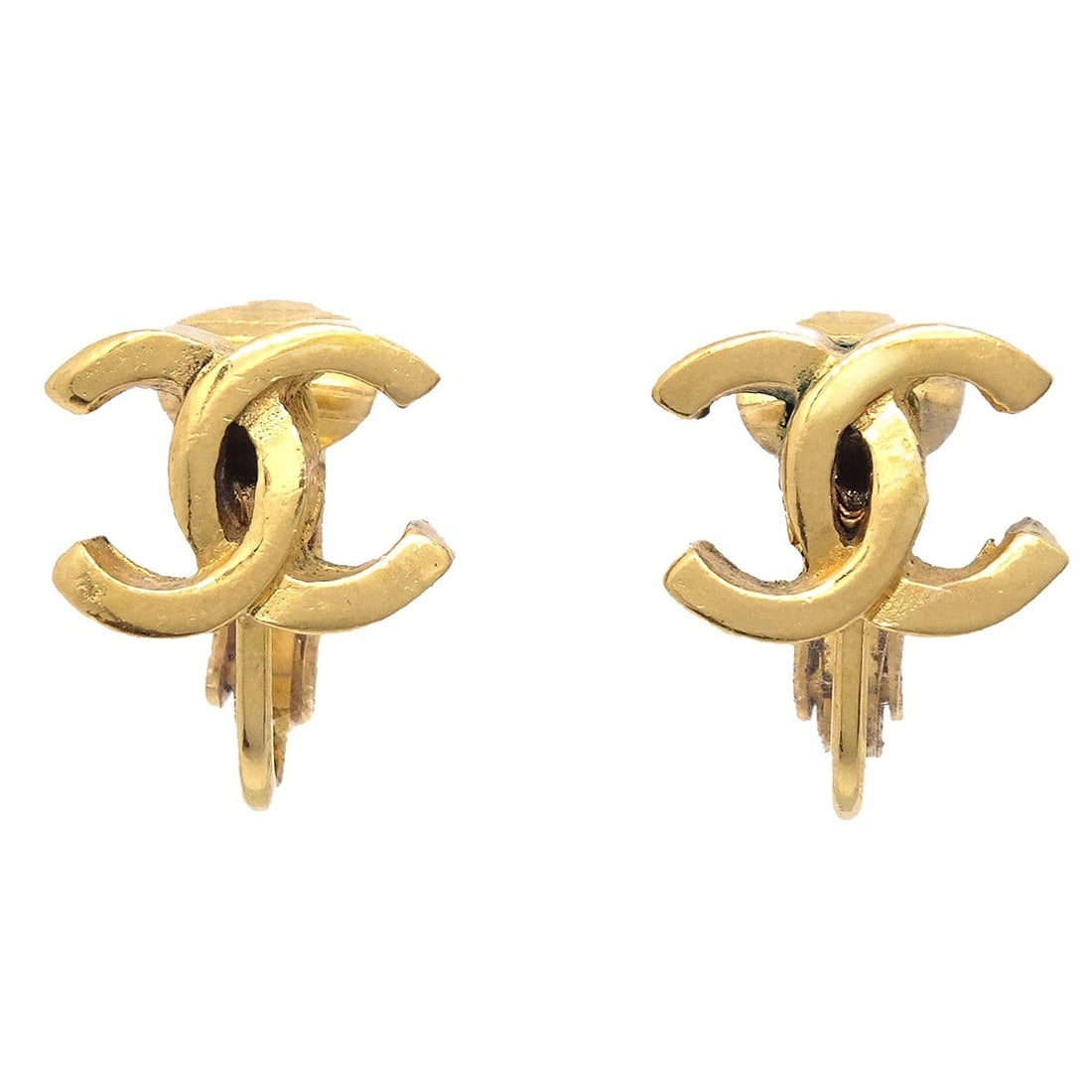 CHANEL Gold-Plated CC Logo Clip-On Earrings: CHANEL Gold-Plated CC Logo Clip-On Earrings These Chanel CC earrings feature the iconic logo design in a gold-plated finish. Designed with a clip-on closure, they offer both style and comfort. Their c