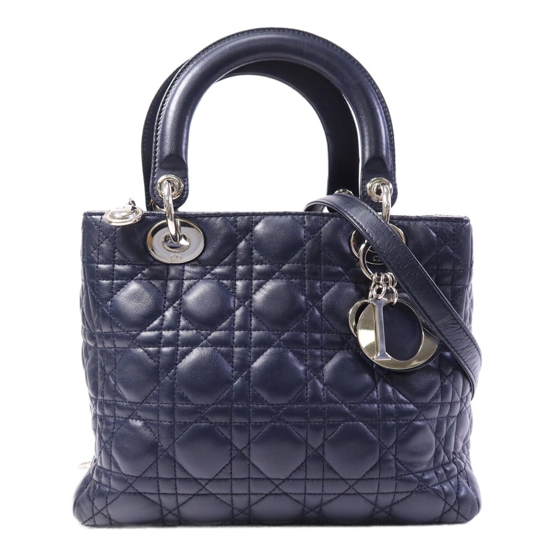 Dior Lady Dior Small Blue Lambskin 2 Way Shoulder Bag: Dior Lady Dior Small Blue Lambskin 2 Way Shoulder Bag This Lady Dior small 2-way shoulder bag features luxurious blue lambskin leather and silver-tone hardware. Designed for versatility, it can be wor