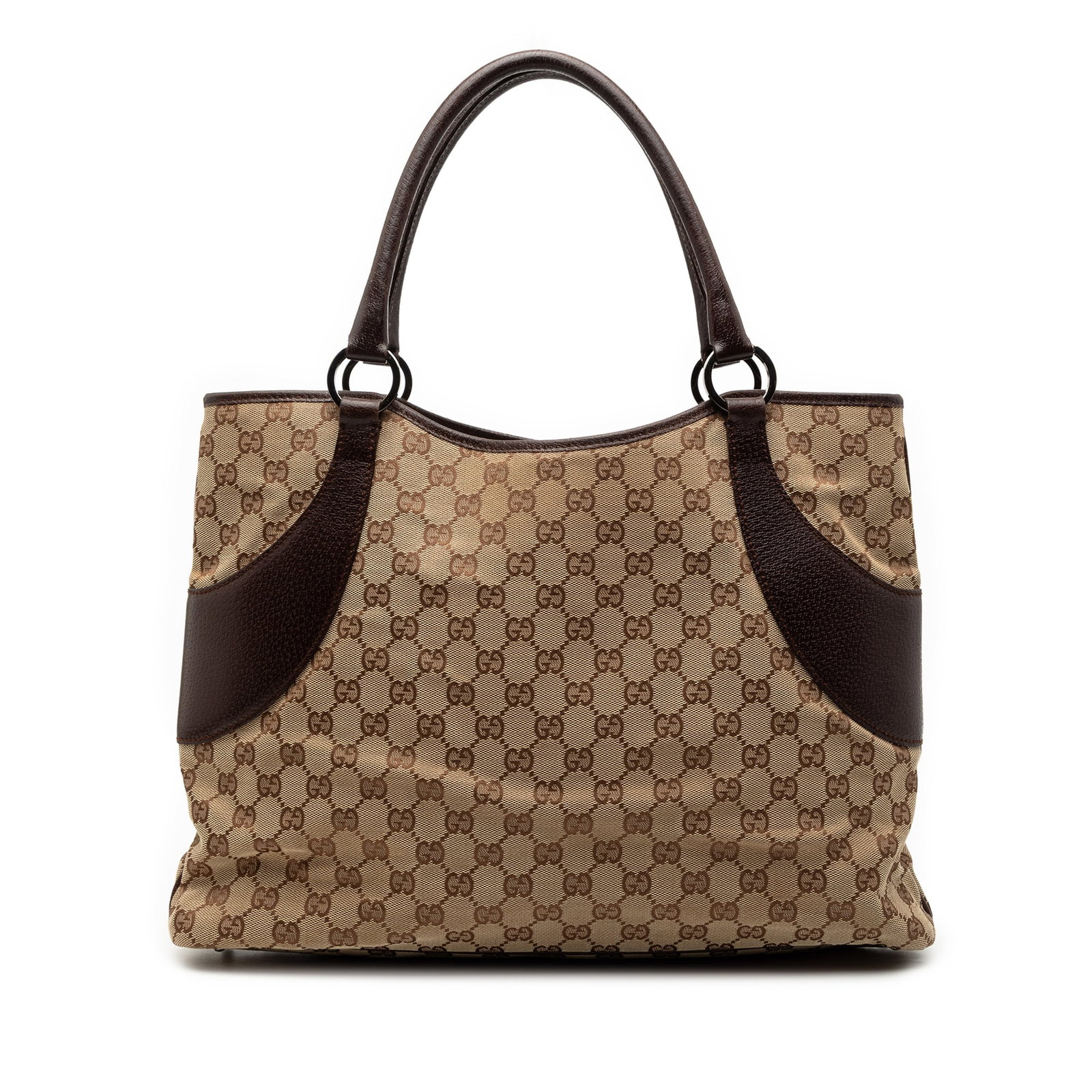 Brown GG Canvas Tote Bag by Gucci with Leather Trim: Brown GG Canvas Tote Bag by Gucci with Leather Trim This Gucci GG Canvas Tote features a canvas body with leather trim, rolled leather straps, an open top with a magnetic closure, and an interior zip 