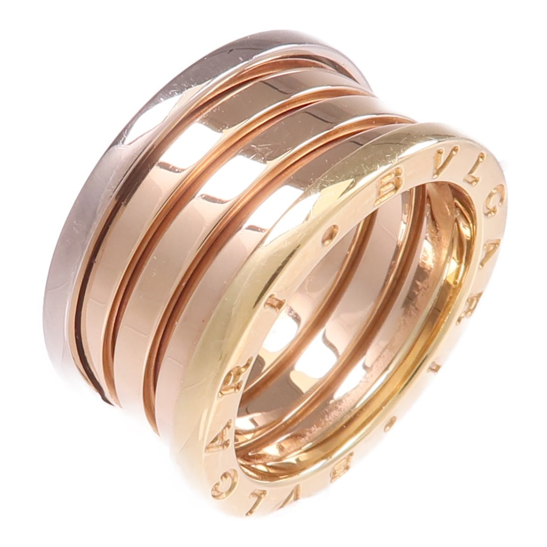B-zero1 18K Tricolor Gold Ring by BVLGARI Size 6.5: B-zero1 18K Tricolor Gold Ring by BVLGARI Size 6.5 This BVLGARI B-zero1 ring features a sophisticated design crafted from 18K yellow gold, offering a timeless and elegant look. Designed for women, thi