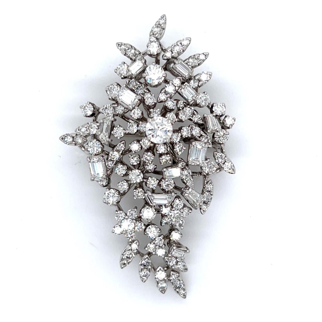 Platinum Art Deco Brooch with Approximately 8 Carats Diamond: Platinum Art Deco Brooch with Approximately 8 Carats Diamond This Art Deco brooch is crafted in platinum and features approximately 8.00 carats of diamonds with G-H color and VVS-VS clarity. The brooc