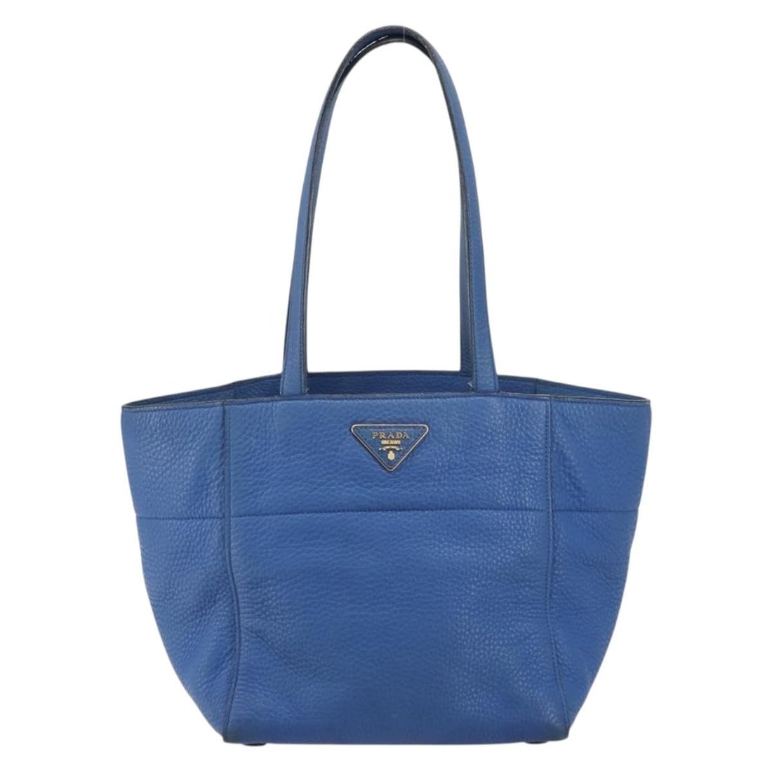 Prada Blue Leather Tote Bag Vitello Daino 36cm by 23cm by 18cm: Prada Blue Leather Tote Bag Vitello Daino 36cm by 23cm by 18cm This Prada Tote Vitello Daino for women is crafted from blue leather with a spacious design. It features visible signs of use including s
