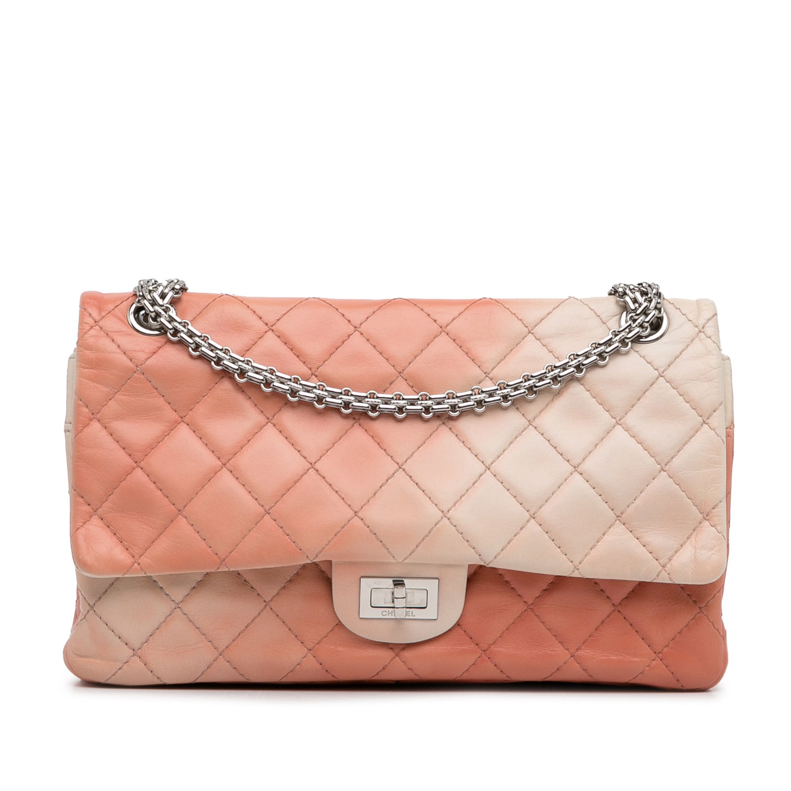 Chanel Ombre Reissue 225 Double Flap Orange Leather Shoulder Bag: Chanel Ombre Reissue 225 Double Flap Orange Leather Shoulder Bag The Chanel Ombre Reissue 225 Double Flap shoulder bag is a stunning accessory crafted from luxurious calfskin leather. It features chai