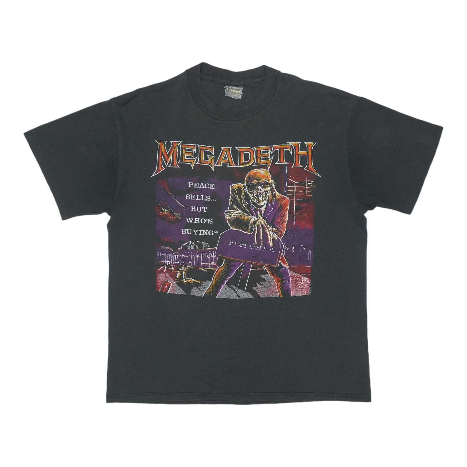 Vintage 1986 Megadeth Peace Sells Tour Black Poly Cotton Shirt Large: Vintage 1986 Megadeth Peace Sells Tour Black Poly Cotton Shirt Large This is an original vintage 1986 Megadeth "Peace Sells But Who Is Buying" tour shirt, featuring both front and back graphics. It is