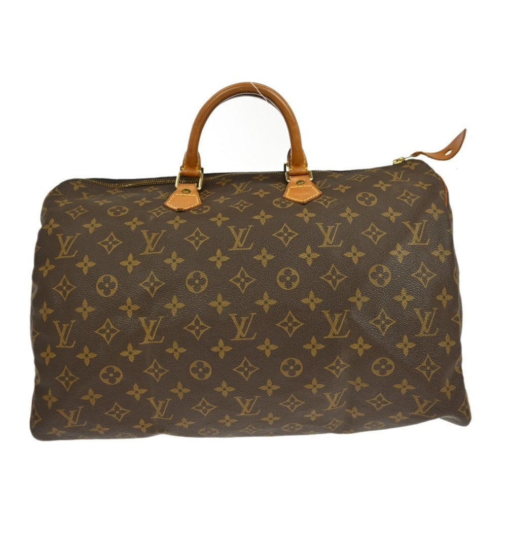 Louis Vuitton Speedy 40 Monogram Canvas Large Duffle Bag M41522: Louis Vuitton Speedy 40 Monogram Canvas Large Duffle Bag M41522 This is a vintage Louis Vuitton Speedy 40 duffle handbag crafted from monogram canvas leather in brown. It features a large size with do