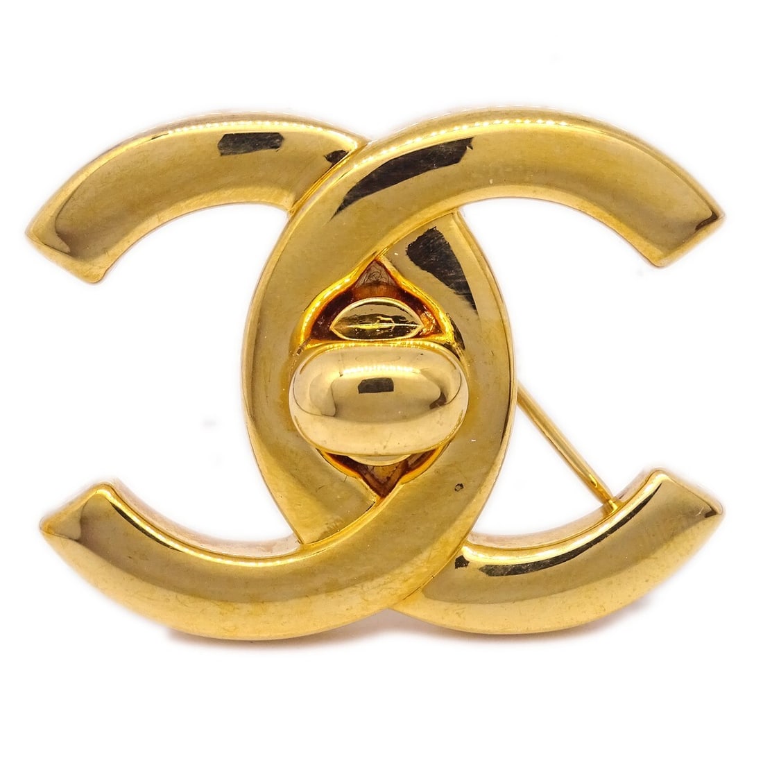 Chanel Turnlock Brooch Pin Large Vintage Gold Plated 96P: Chanel Turnlock Brooch Pin Large Vintage Gold Plated 96P This stunning Chanel Turnlock Brooch Pin is a large vintage piece, expertly crafted from gold-plated material, showcasing a beautiful gold fini