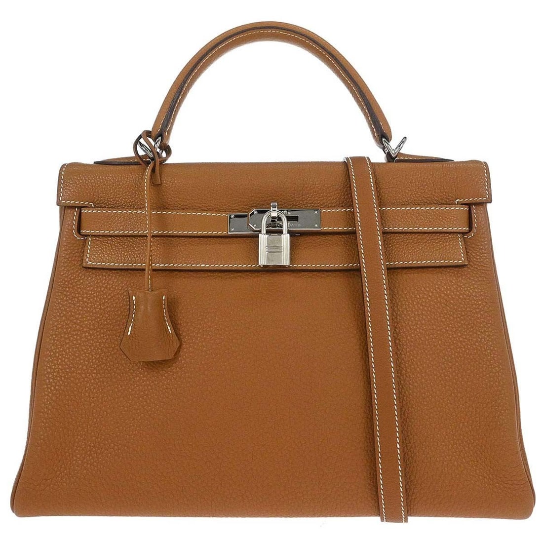 Kelly 32cm Leather Bag in Gold with Palladium Accents by Hermes: Kelly 32cm Leather Bag in Gold with Palladium Accents by Hermes This is a Hermes Kelly handbag crafted from gold-colored Togo leather and finished with palladium hardware. Designed for women, the hand