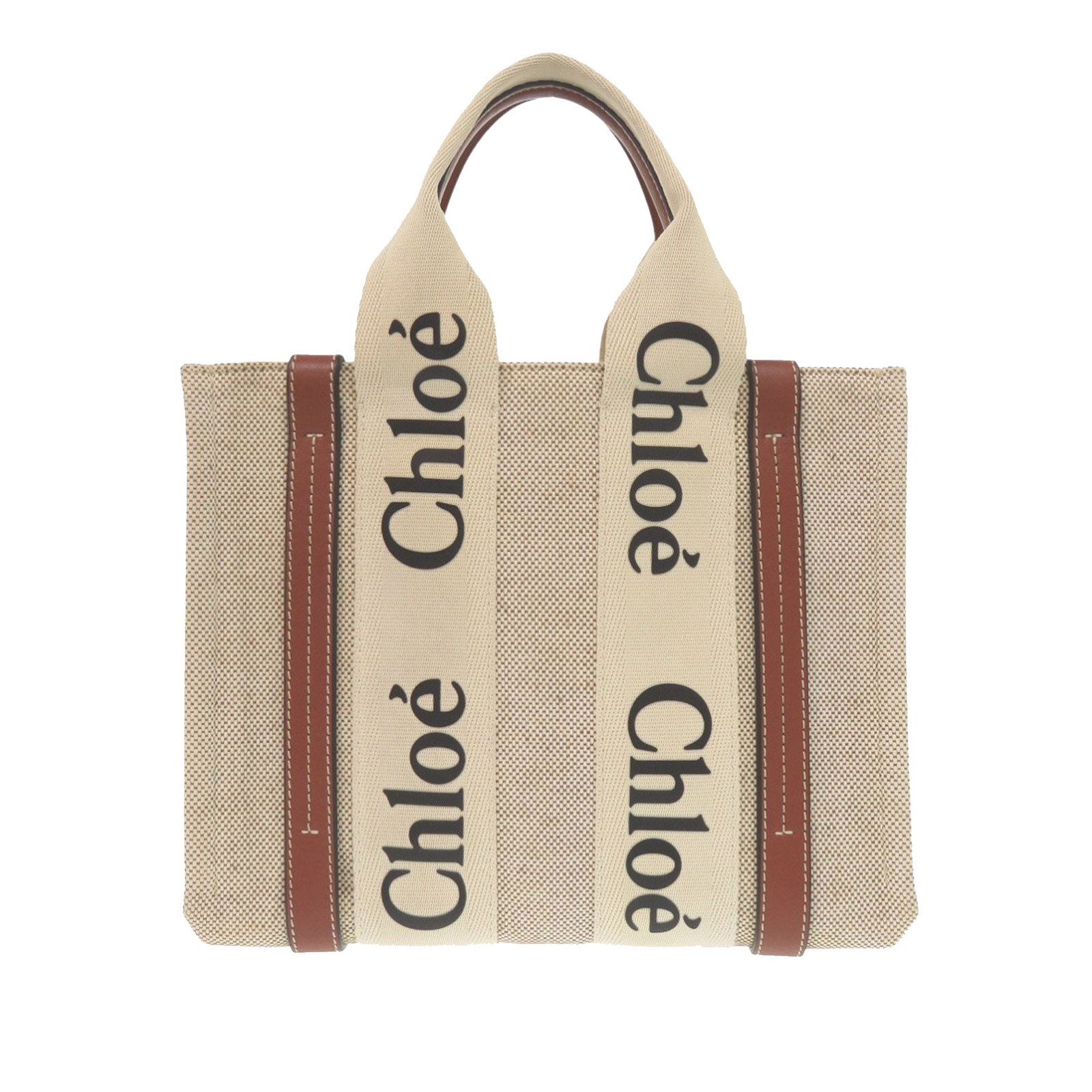 Small Woody Satchel Beige Canvas and Leather Tote by Chloe: Small Woody Satchel Beige Canvas and Leather Tote by Chloe This Chloe Small Canvas Woody Tote features a beige canvas body with leather trim, flat canvas handles with leather details, a flat leather s