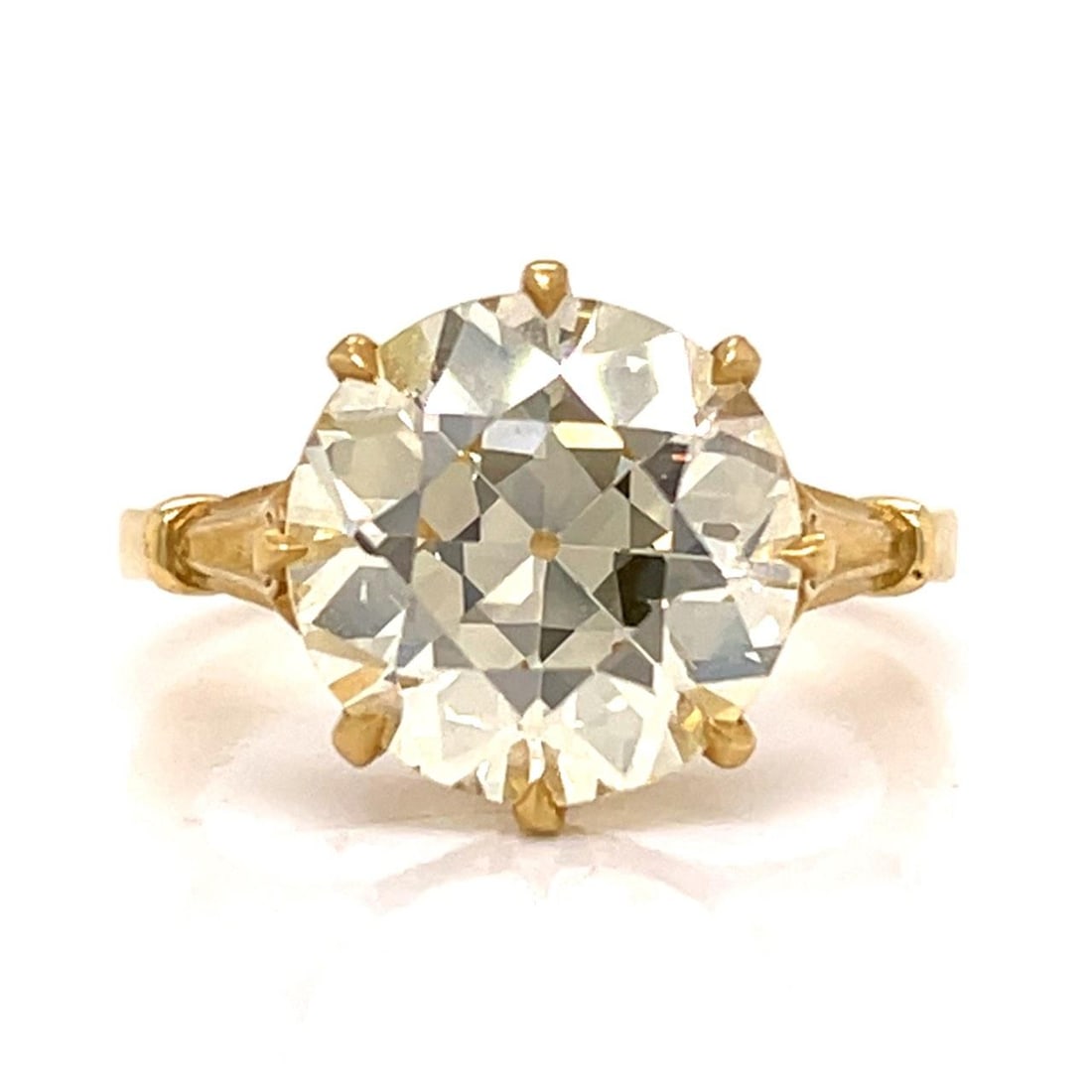 GIA Certified Platinum Engagement Ring with 5.30 Ct Old European Diamond: GIA Certified Platinum Engagement Ring with 5.30 Ct Old European Diamond This platinum engagement ring features a GIA certified 5.30 carat Old European-cut diamond with U-V color and VS1 clarity. The 