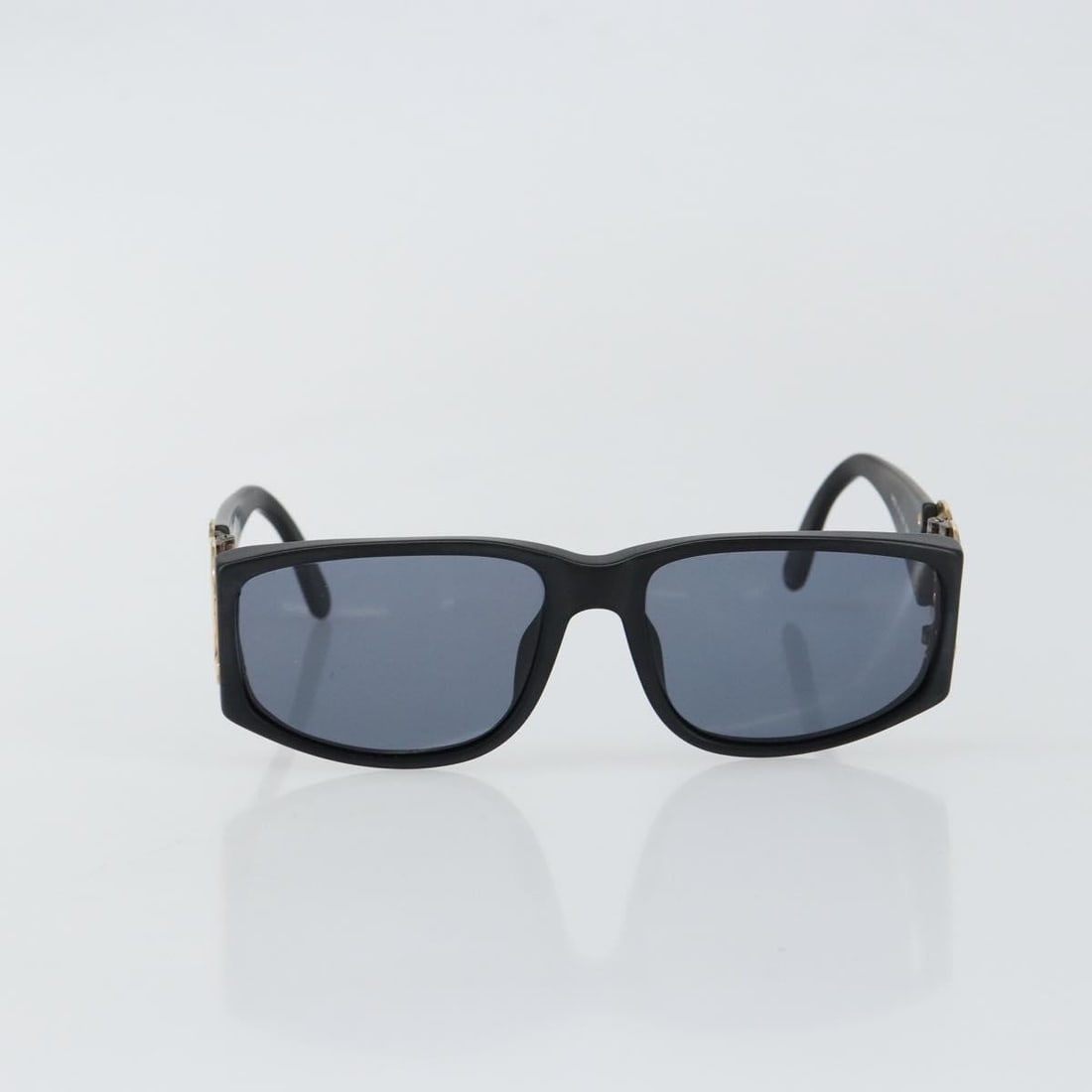 Black Plastic Sunglasses with Chanel CC Logo for Women: Black Plastic Sunglasses with Chanel CC Logo for Women These Chanel Logo CC sunglasses for women feature a black plastic frame with the iconic Chanel logo. Made in Italy, they offer a stylish design s