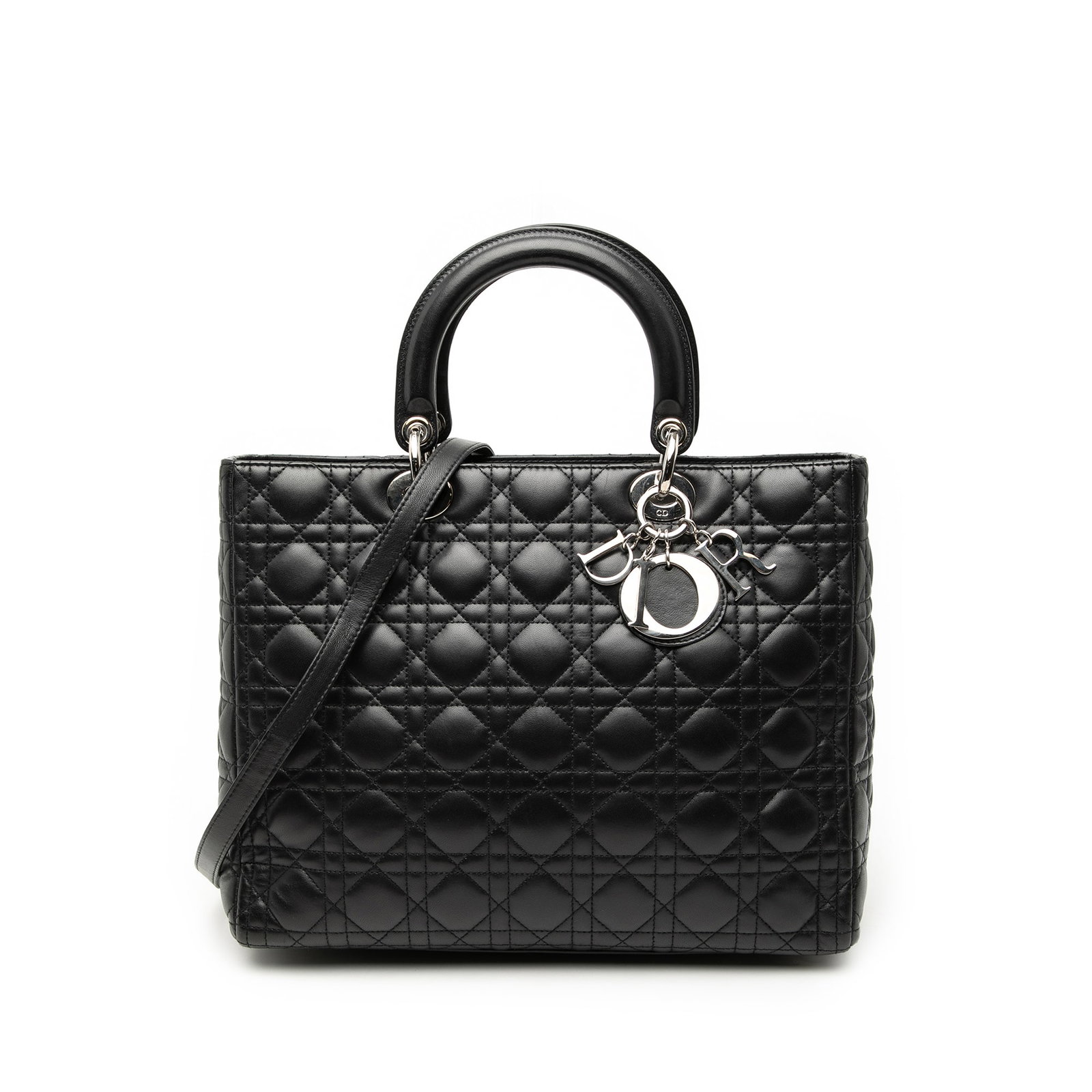 Dior Lady Dior Large Cannage Black Quilted Lambskin Handbag with Strap: Dior Lady Dior Large Cannage Black Quilted Lambskin Handbag with Strap This Lady Dior handbag showcases a quilted lambskin leather body in black, complemented by flat top handles and a detachable flat