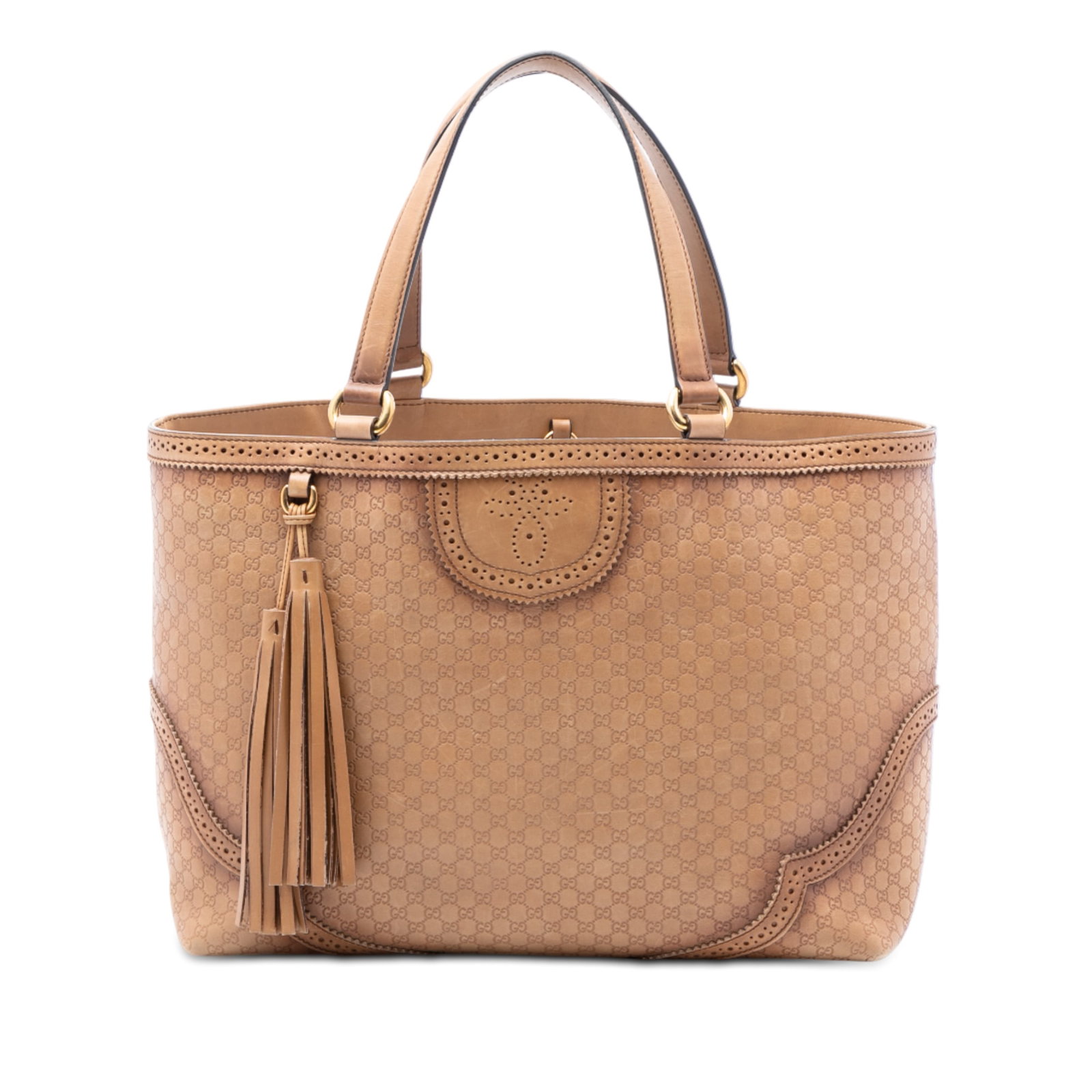 Brown Leather Tote with Embossed Microguccissima Brogue Duilio Pattern by Gucci: Brown Leather Tote with Embossed Microguccissima Brogue Duilio Pattern by Gucci This Gucci Microguccissima Brogue Duilio Tote features an embossed leather body with tassel detail, flat leather handles