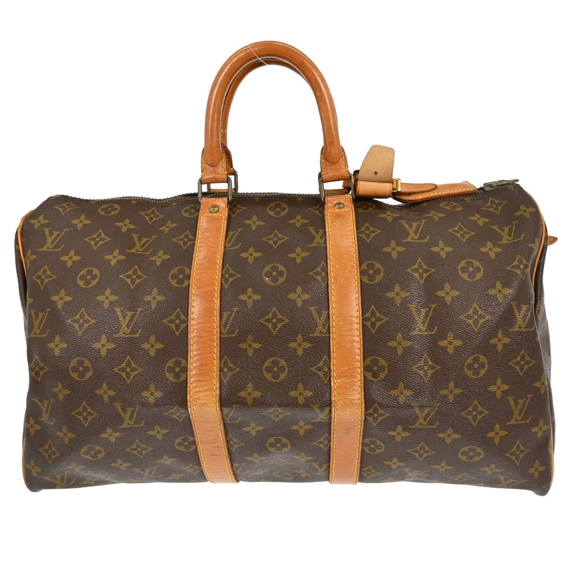 Keepall Travel Duffel in Monogram Canvas by Louis Vuitton: Keepall Travel Duffel in Monogram Canvas by Louis Vuitton This Louis Vuitton Keepall Bag features the iconic Monogram canvas design in brown. Suitable for unisex use, the bag is crafted from durable c