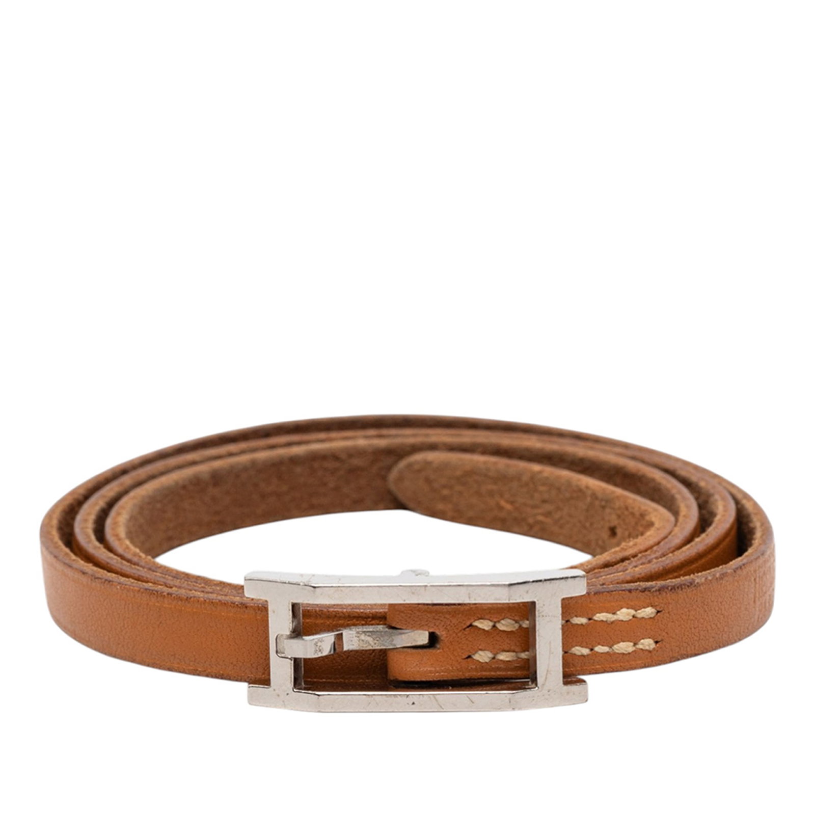 Hermes Behapi Triple Tour Brown Leather Bracelet with Palladium Buckle: Hermes Behapi Triple Tour Brown Leather Bracelet with Palladium Buckle This Hermes Swift Behapi Triple Tour Bracelet features a leather body in brown with a palladium-plated buckle closure. The bracel