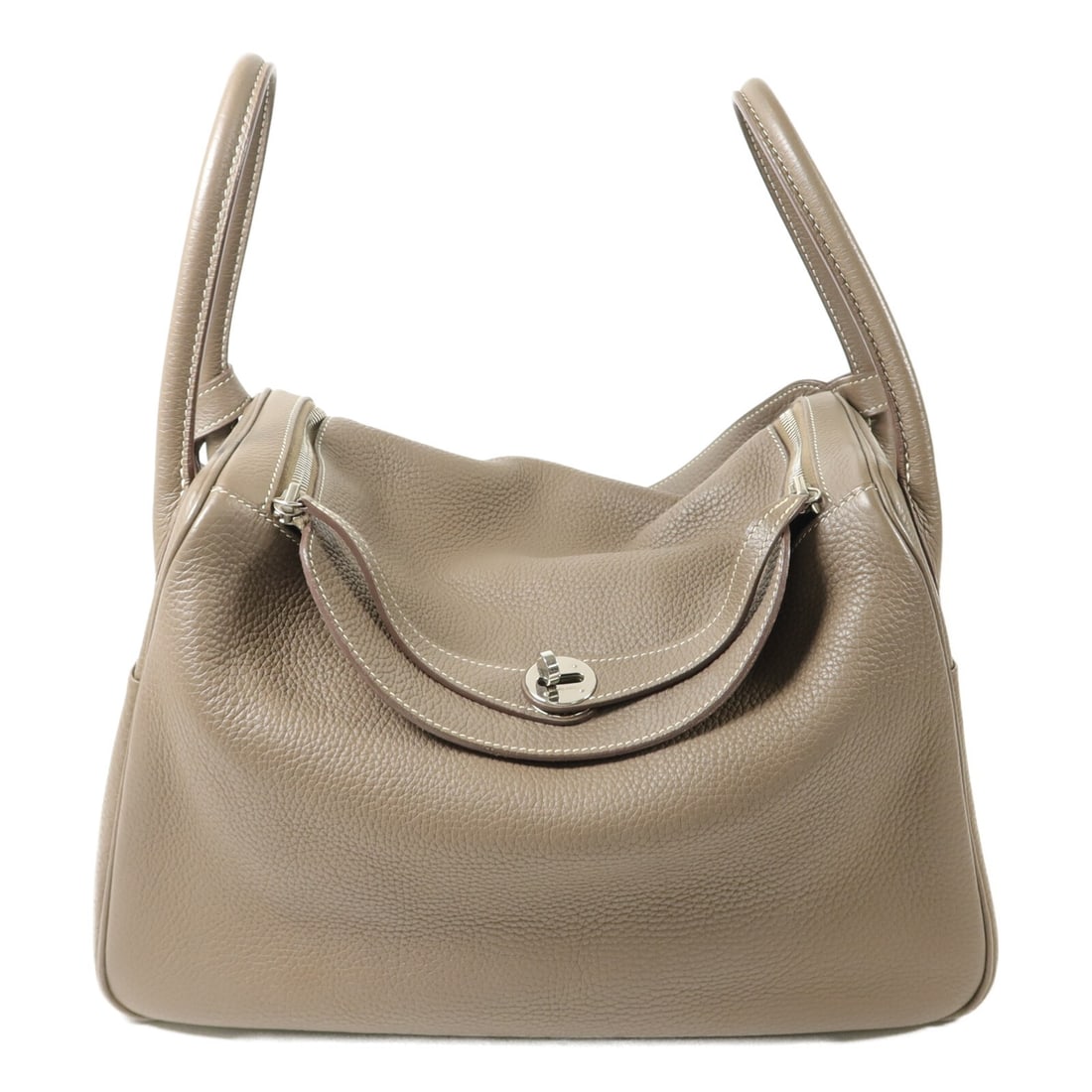Hermes Lindy 34 Etoupe Taurillon Clemence Calfskin Shoulder Bag: Hermes Lindy 34 Etoupe Taurillon Clemence Calfskin Shoulder Bag This Hermes Lindy 34 2-way shoulder bag is crafted from Taurillon Clemence calfskin in a sophisticated gray shade. Designed for versatil