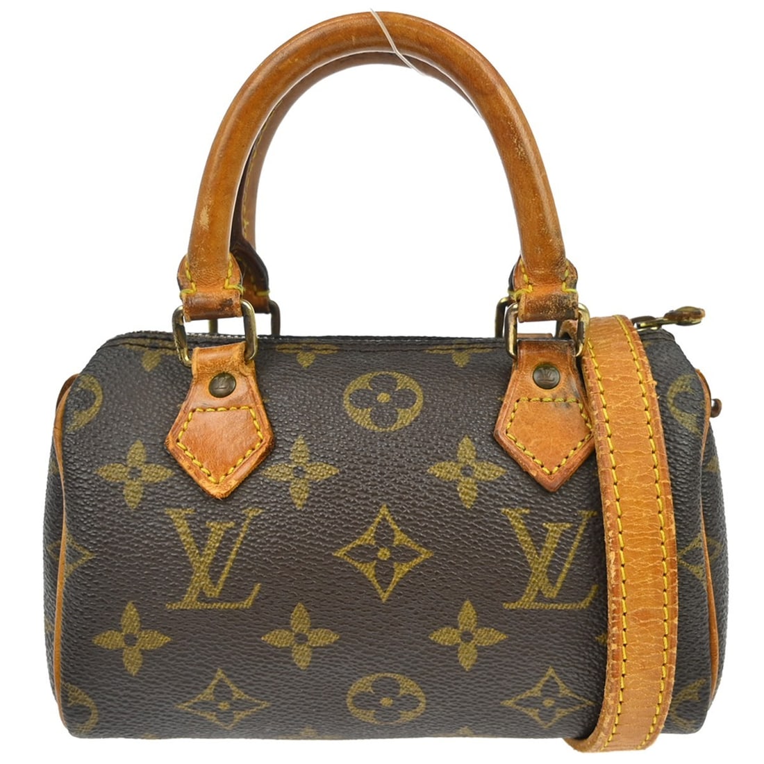 Louis Vuitton Mini Speedy Monogram Canvas Brown Handbag M41534: Louis Vuitton Mini Speedy Monogram Canvas Brown Handbag M41534 This Louis Vuitton Mini Speedy handbag features the classic Monogram canvas leather exterior in brown, complemented by a zip closure and 