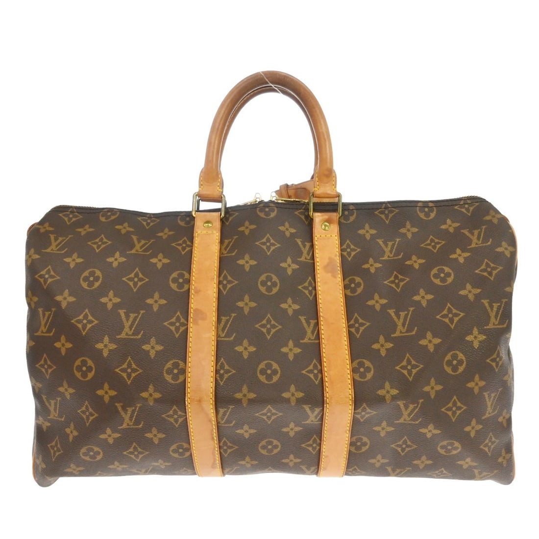 Louis Vuitton Keepall Monogram Brown Canvas Travel Bag: Louis Vuitton Keepall Monogram Brown Canvas Travel Bag This Louis Vuitton Keepall Bag features the iconic Monogram canvas in a classic brown color. Designed for unisex use, this vintage bag is crafted