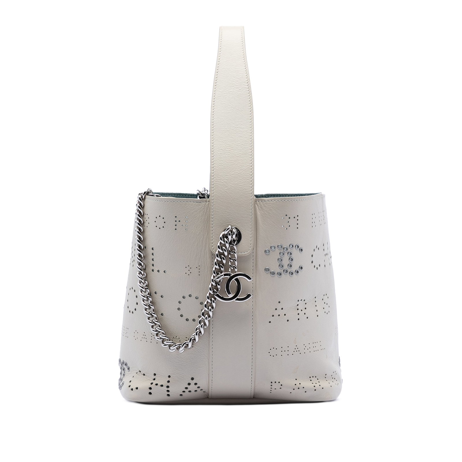 Chanel White Perforated Leather Bucket Bag with Eyelet Logo Detail: Chanel White Perforated Leather Bucket Bag with Eyelet Logo Detail This Chanel Small Perforated Calfskin Logo Eyelet Bucket Bag features a white leather body with small piercing details, a flat leathe