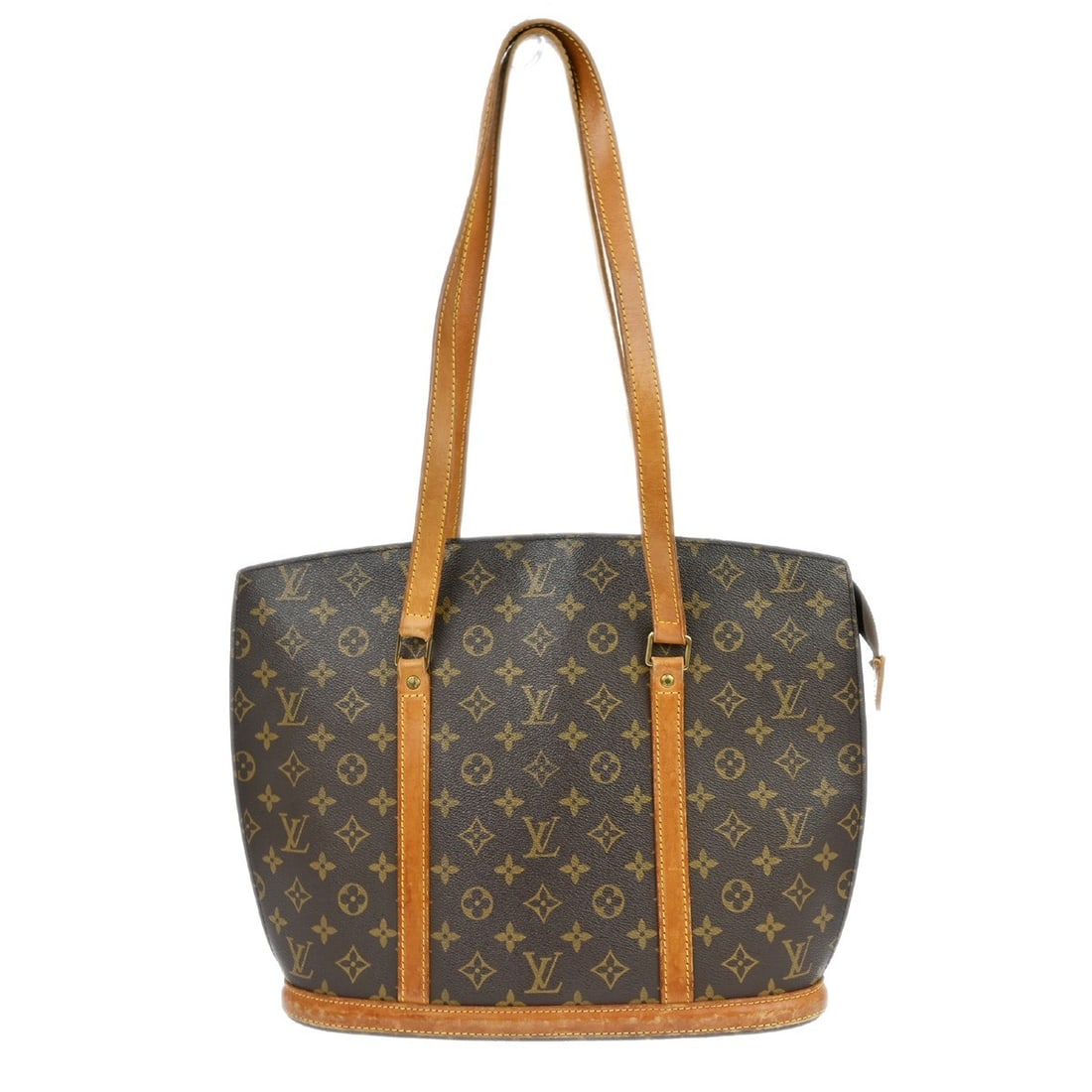 Louis Vuitton Babylone Monogram Canvas Large Tote Bag Brown Leather Handles: Louis Vuitton Babylone Monogram Canvas Large Tote Bag Brown Leather Handles This Louis Vuitton Babylone hand tote bag features the signature monogram canvas leather exterior and a spacious large size.