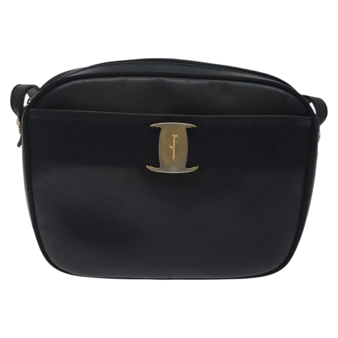 Navy Leather Vala Shoulder Purse by Salvatore Ferragamo: Navy Leather Vala Shoulder Purse by Salvatore Ferragamo This Salvatore Ferragamo Vala Shoulder Bag is crafted from navy leather and designed for women. Made in Italy, it features a classic silhouette 
