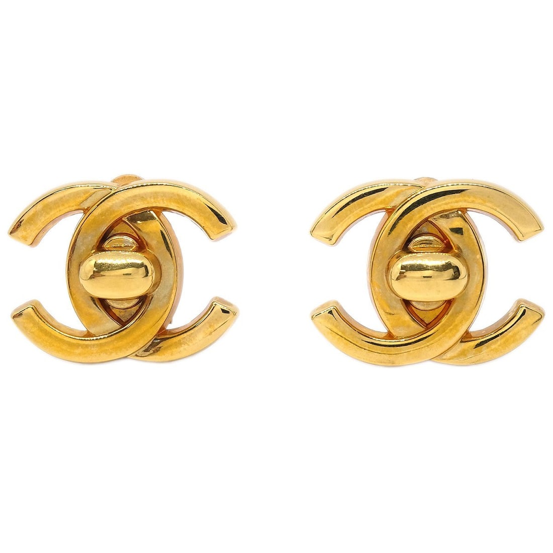 Chanel 96A Gold Plated Large Clip-On Turnlock CC Earrings: Chanel 96A Gold Plated Large Clip-On Turnlock CC Earrings These Chanel CC Turnlock earrings feature a classic gold-plated finish and a large design. They are clip-on style for easy wear and showcase t