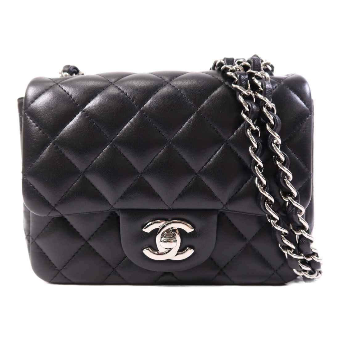 CHANEL Mini Classic CC Lambskin Shoulder Bag Black: CHANEL Mini Classic CC Lambskin Shoulder Bag Black This CHANEL Mini Classic 17 chain shoulder bag is crafted from luxurious black lambskin leather, offering a sophisticated and timeless look. The bag 