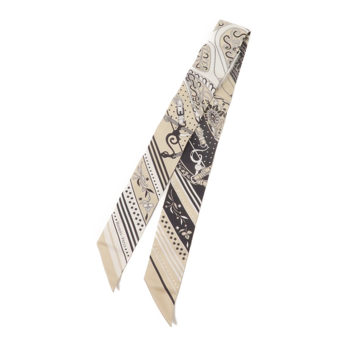 Hermes Beige Silk Twilly Scarf: Hermes Beige Silk Twilly Scarf This Hermes Twilly scarf is crafted from luxurious silk in a sophisticated beige color. Designed for women, it offers a versatile accessory option that can elevate any e