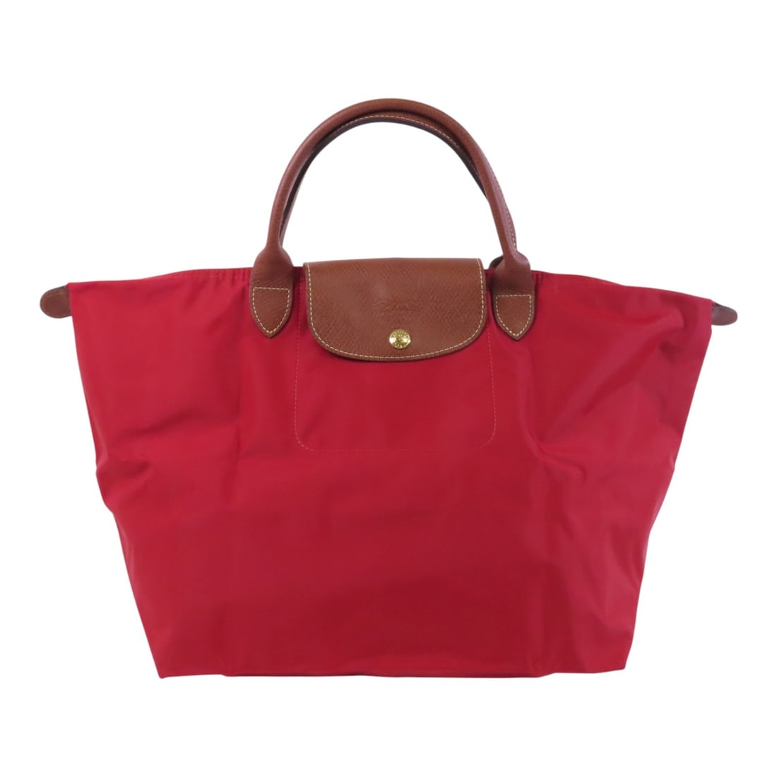 Longchamp Red Nylon Tote Bag GHW 0963074: Longchamp Red Nylon Tote Bag GHW 0963074 This chic Longchamp tote bag is crafted from durable nylon in a vibrant red shade, perfect for adding a pop of color to any outfit. With a height of 10.8 inche