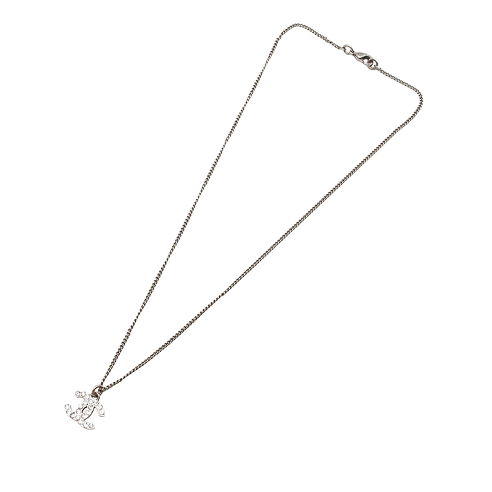 Chanel CC Logo Silver Plated Necklace with Rhinestone Pendant: Chanel CC Logo Silver Plated Necklace with Rhinestone Pendant This Chanel necklace features a silver plated metal chain and a CC logo pendant adorned with rhinestones. It secures with a lobster claw c