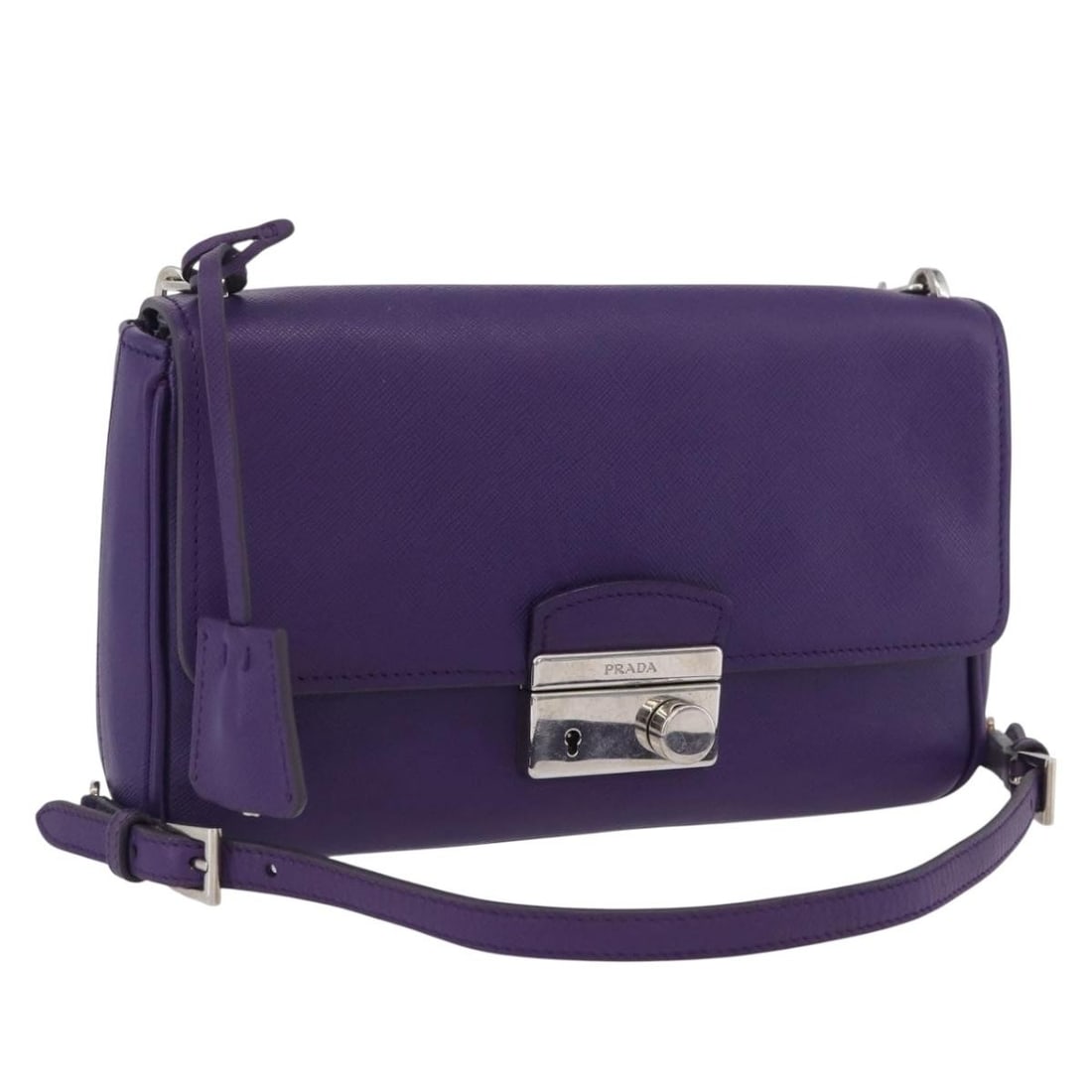 Purple Saffiano Leather Shoulder Bag by Prada with Chain Strap: Purple Saffiano Leather Shoulder Bag by Prada with Chain Strap This PRADA chain shoulder bag is crafted from signature Saffiano leather in a purple and silver colorway. Designed for women, the bag fea