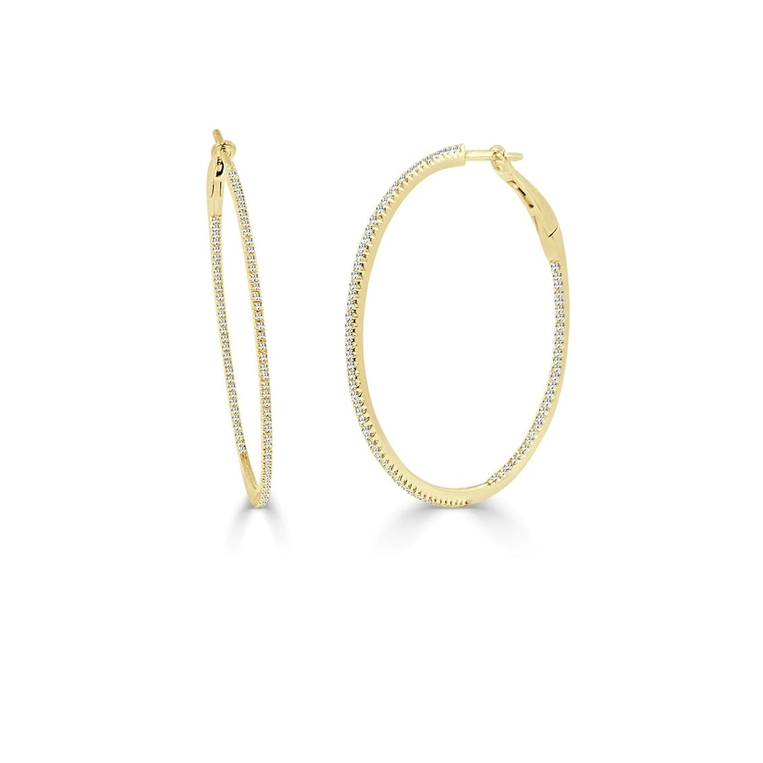 14K Yellow Gold Diamond Hoop Earrings with 0.57 Carat Total Weight: 14K Yellow Gold Diamond Hoop Earrings with 0.57 Carat Total Weight These pre-owned diamond hoop earrings are crafted in 14K yellow gold and feature a total diamond weight of 0.57 carats. The round whi