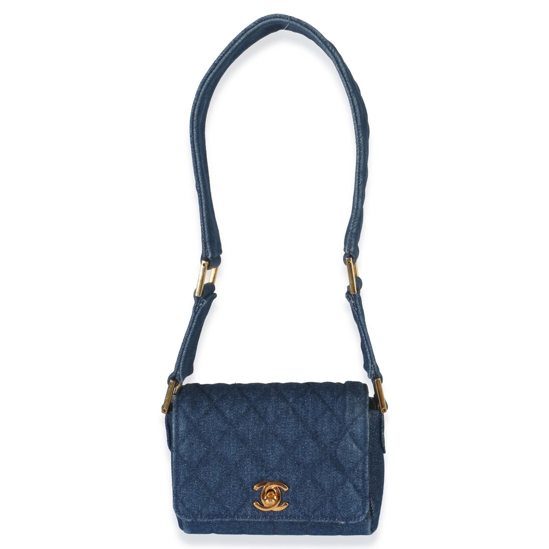 Mini Single Flap Blue Quilted Denim Shoulder Bag by Chanel: Mini Single Flap Blue Quilted Denim Shoulder Bag by Chanel This Chanel Vintage Mini Single Flap Bag features blue quilted denim with gold-tone hardware and a turnlock closure. The compact design is co