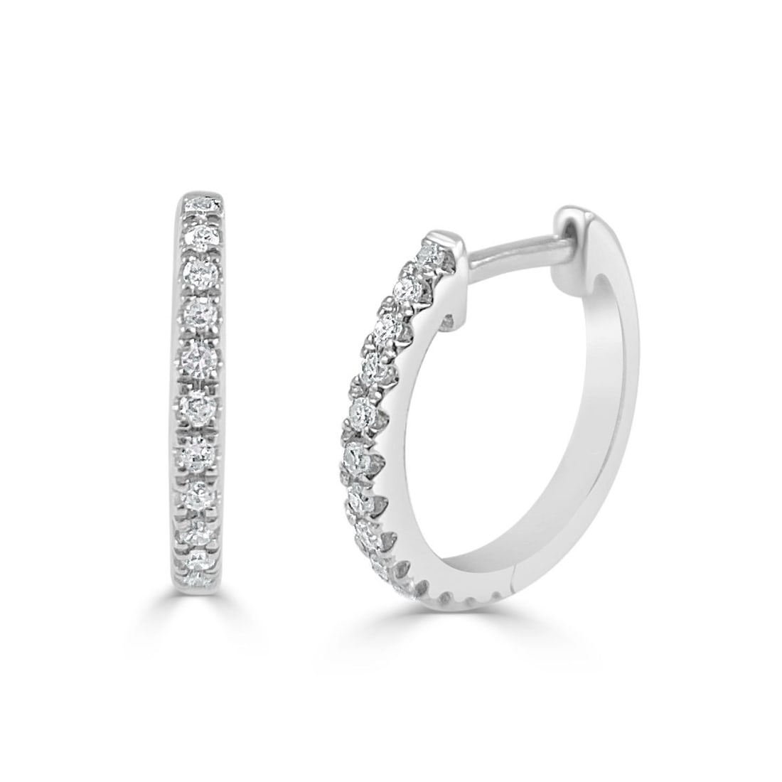 Sabrina Designs Co 14K White Gold Diamond Huggie Earrings for Women: Sabrina Designs Co 14K White Gold Diamond Huggie Earrings for Women These pre-owned women's huggie earrings are crafted in 14k white gold and feature a total of 26 round white diamonds with a combined