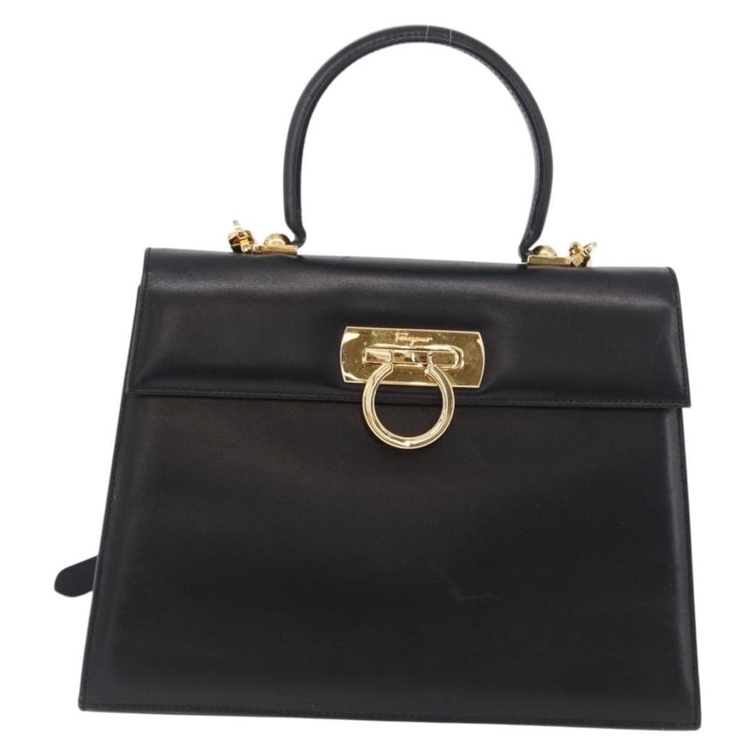 Salvatore Ferragamo Black Leather Convertible Handbag with Top Handle: Salvatore Ferragamo Black Leather Convertible Handbag with Top Handle This Salvatore Ferragamo convertible top handle bag is crafted from black leather and designed for women. Made in Italy, it featur